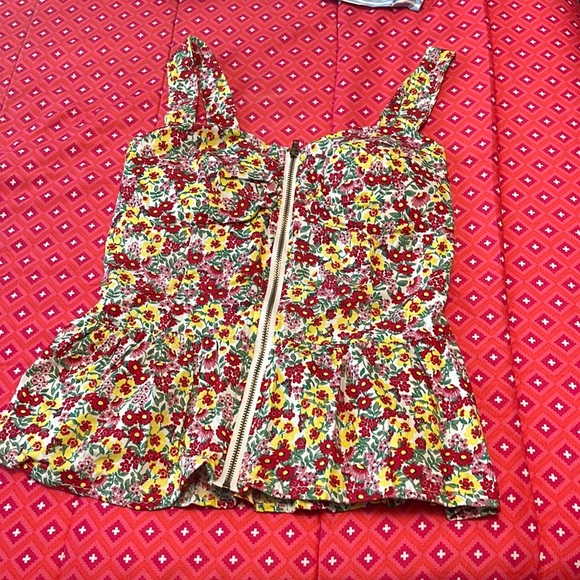 T- shirt is flower print . Size is small and brand is liberty love. - Picture 1 of 3